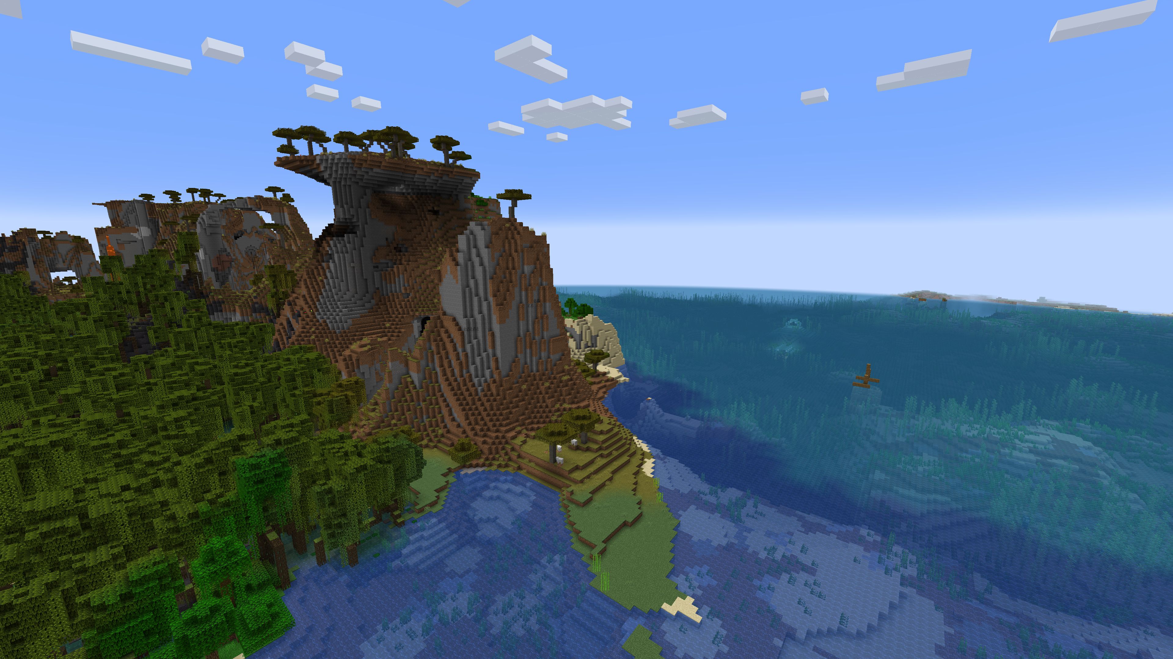 Graine de Minecraft 1.20 avec marais de mangrove, biome de la jungle et des collines de la savane et monument de l'océan et naufrage dans l'océan