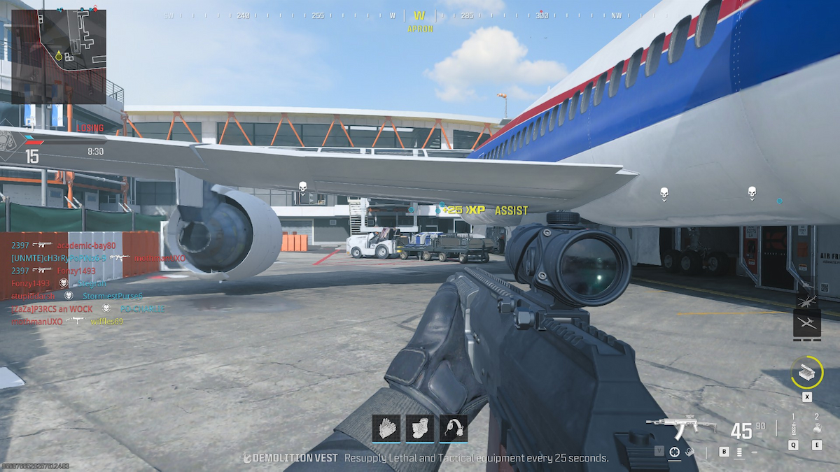 Joueur Mw3 debout à côté de l'avion