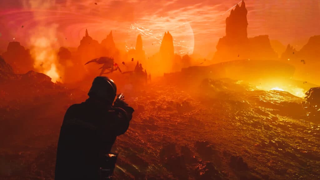 Un Helldiver s'approche d'un Terminide sur une planète rouge dans Helldivers 2